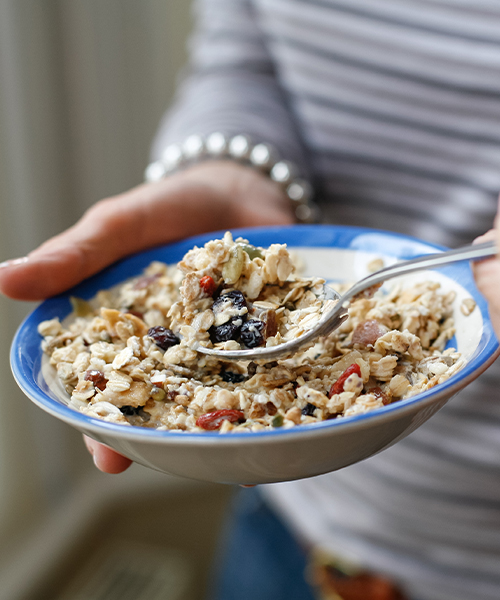 person eating oatmeal